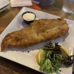 Fish and chips with side of loaded mashed potatoes.