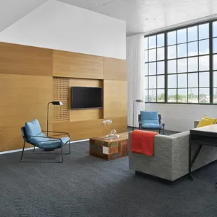 Contemporary guest rooms and suites at Fordson Hotel.