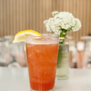 a drink in a tall glass