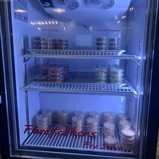 Fridge with peppers/fry sauce in lobby