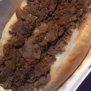 a closeup of a sandwich in a styrofoam container