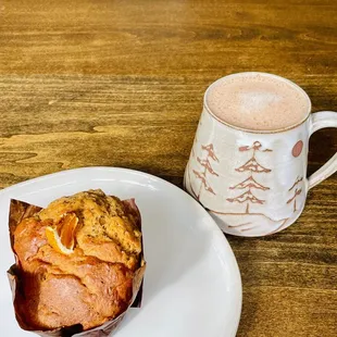 a muffin and a cup of coffee