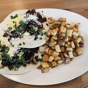 Chorizo breakfast tacos and potatoes