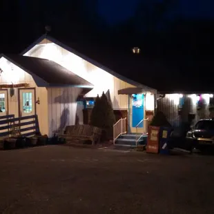 the front of the building at night