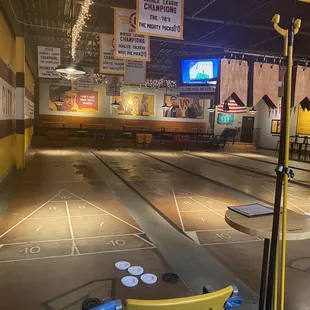 Indoor shuffleboard courts