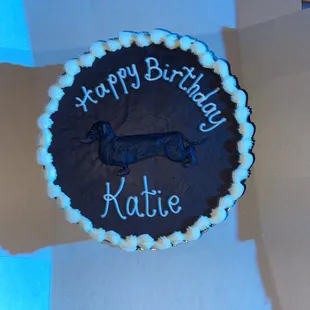 a birthday cake with a dachshund on it