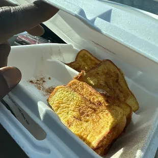 french toast in a styrofoam container