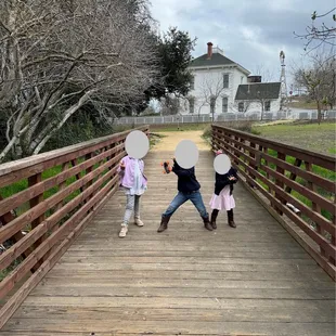Bridge between the glass mansion house and the farm/barn