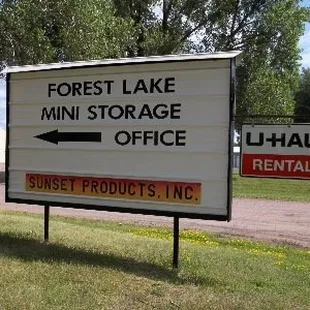 Our office sign by road