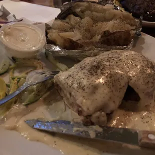 Chicken cordon bleu added mushroom onions.  The sauce tasted kinda like Alfredo but good.  Shredded squash and zucchini.  Baked potato