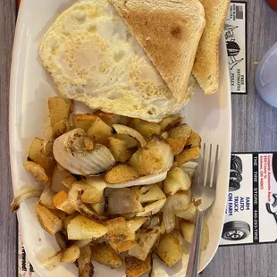 Eggs, home fries + onions ( fantastic!) toast.
