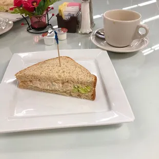 Half tuna salad sandwich and coffee