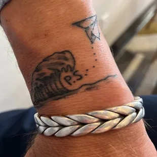 My paper airplane tattoo