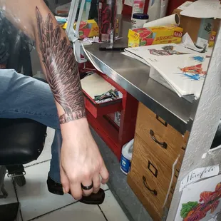 Wing tattoo done by Jim Sweeney