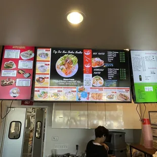 menus on the wall of a restaurant