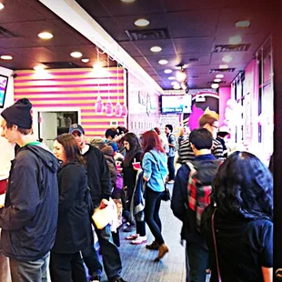 a line of people waiting in line