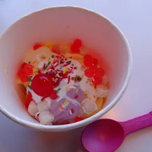 Mango + blackberry yogurt, mochi, coconut, marshmallow sauce, sprinkles, strawberry boba and cherry. I freakin' love boba!