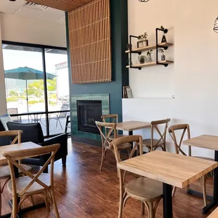 tables, chairs, and fireplace