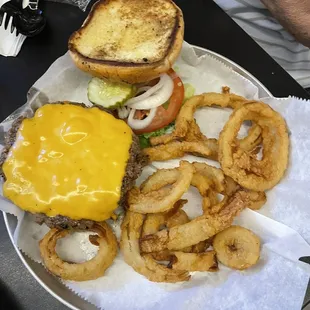Cheeseburger with up charge onion rings (none have been eaten)
