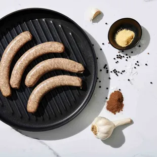 BRATWURST: A classic bratwurst mixed with mustard powder, white pepper, mace and our own signature blend of spices.