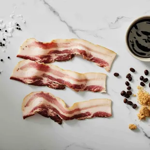 Coffee BACON: With hints of coffee and a mouth- watering sweetness, no breakfast is complete without our signature bacon.