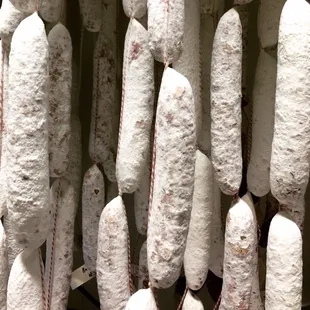 Tripel Pigs Salami, No. 1 Salami and El Diablo Chorizo. Our salamis and chorizo develop a white bloom (mold) after a few days.