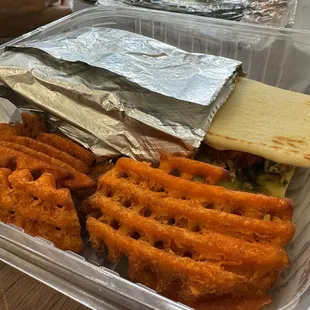 a sandwich and waffles