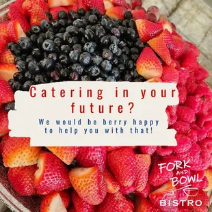 a bowl of strawberries and blueberries