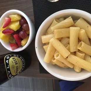 Kids meal of buttered pasta with fruit and a root beer (normally this is mac &amp; cheese instead of buttered noodles)