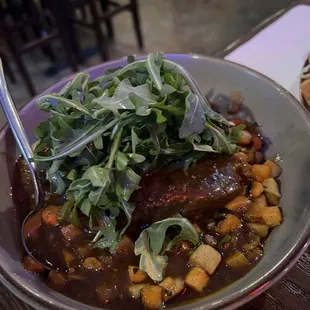 Short ribs.  Very hearty, and filling! Good flavor, reminds you of something close to home.