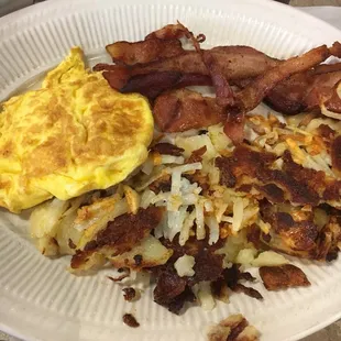 Scrambled eggs, bacon and potatoes.