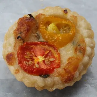 Individual Tomato Basil Pie.  2-3 bites each, 2 for 3 bucks.