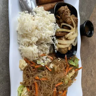 Chicken Adobo, Pancit, lumpia and rice.