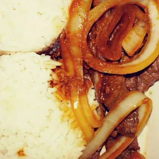 Bistik: beef cooked with soy sauce and onions. A bit over cooked for my taste, but the flavor is rich. Looks simple but tastes complex!