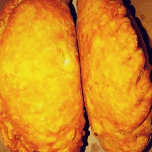 Empanadas. Don't know what the filling is. Huge. But didn't care for the taste at all.
