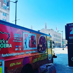 a food truck parked on the side of the road