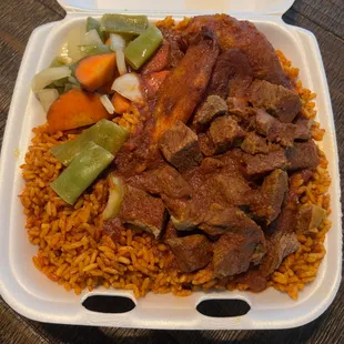 Stewed beef cubes, jollof rice, mixed veggies and plantain
