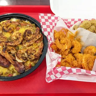 The Cajun shrimp and cheesey grits with andouille sausage. Buffalo shrimp and fried okra.  Yum !