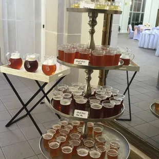 a tiered display of cups of tea