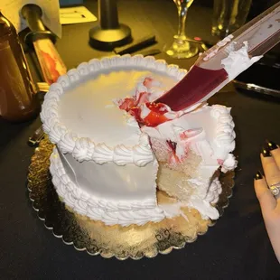 Cake for dessert! Novelty knives were handed out to use for cutting this really big cake for 2!