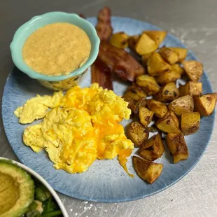 Egg plate, scrambled with cheese + bacon, hash &amp; grits