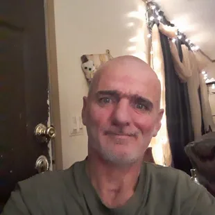 a man in a green shirt