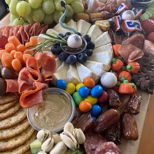 Halloween party board. Even had pumpkins, skeletons and candy incorporated to make it festive!