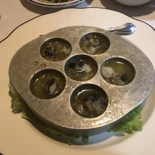 Escargots were very good! Dont forget to dip the homebaked bread in the butter and garlic sauce.