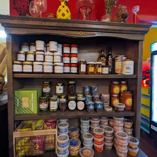 a shelf full of food