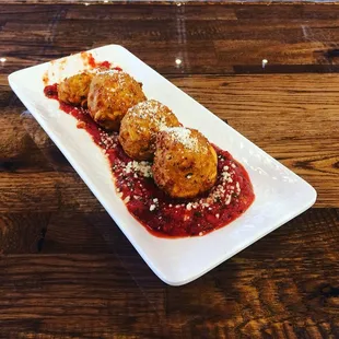 Our Hush Puppy platter w/ our signature marinara sauce