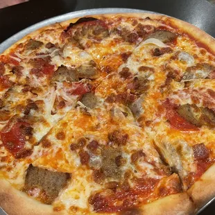 Meat Lovers Pizza, sun onions in place of ham