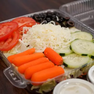 a salad in a plastic container