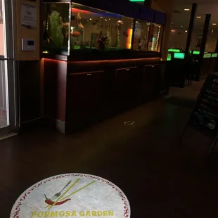 a circular sign in a restaurant