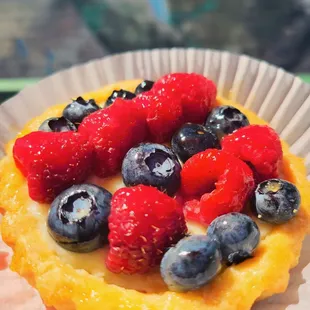 a pastry with berries and blueberries